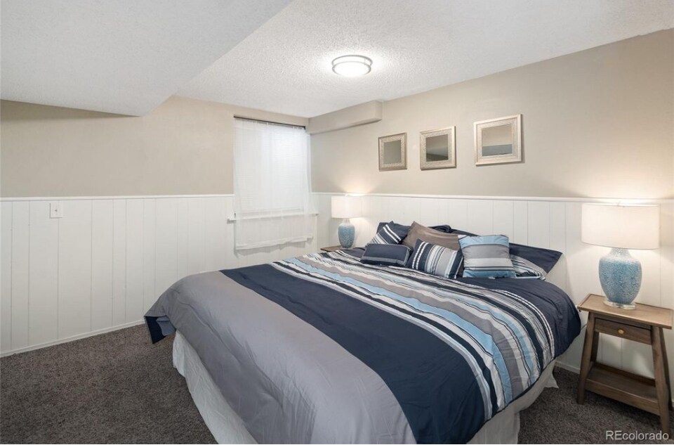 Downstairs bedroom - 10587 W Maplewood Dr