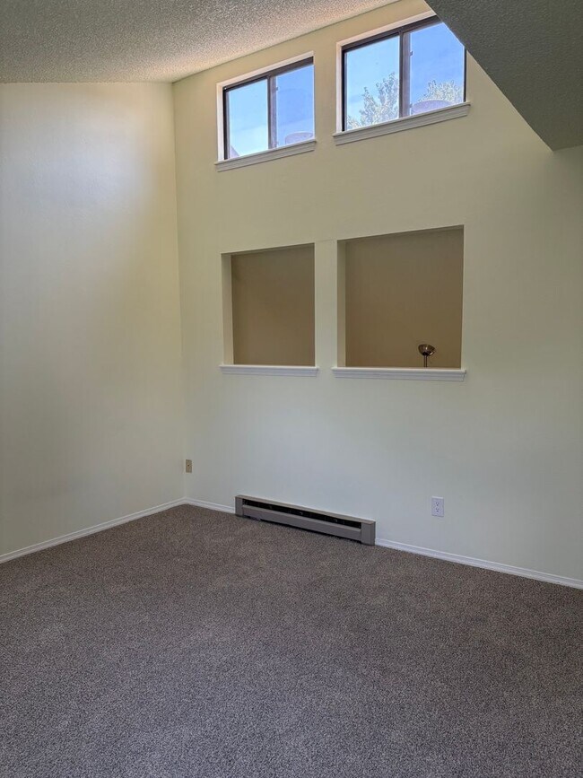 Building Photo - Village Seven 2 Bedroom Townhome with Wood...
