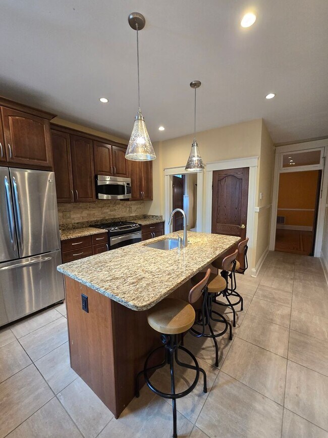 Building Photo - 3-Bedroom, 1.5 Bathroom Charles Village Townhouse
