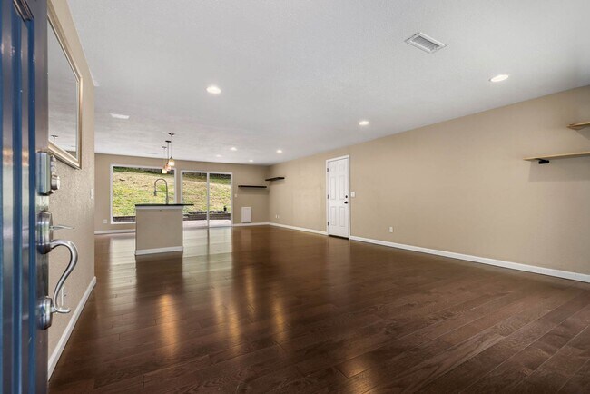 Building Photo - Updated Charmer with Open Kitchen, Private Yard & 2-Car Garage