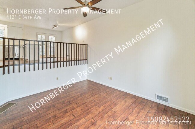 Building Photo - 4124 E 34th Ave