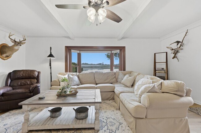 Building Photo - Stunning 4-Bedroom Waterfront Retreat with Modern Upgrades & Lake Living.