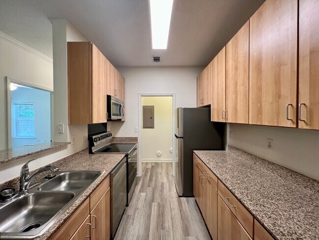 Building Photo - 3-Bed, 2-Bath Condo with Garage! One month...