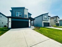 Building Photo - {13305} Less Than 2 Year Old 1.5 Story in ...