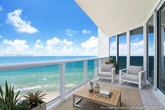 Building Photo - 19333 Collins Ave