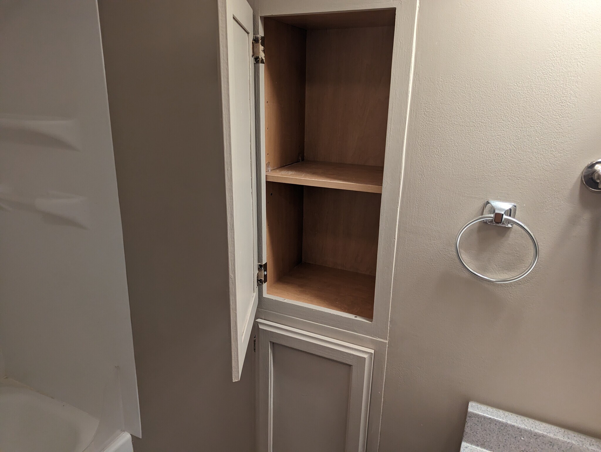 Two storage areas in bathroom. - 1042 Cameron St