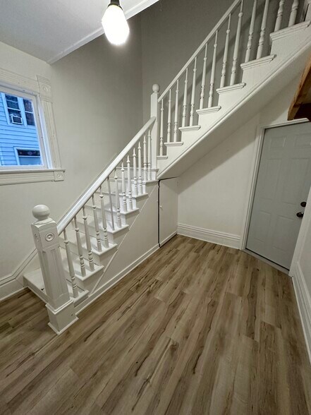 main entry in front to unit 1 and upper unit 3 of house - 510 Mather St