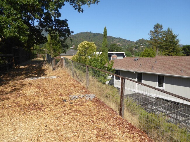 Building Photo - SPACIOUS FOUR BEDROOM / THREE AND HALF BAT...