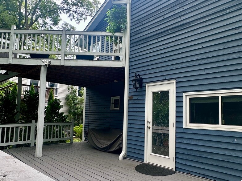 Back porch with bed swing and entrance to unit B - 778 Charles Allen Dr NE