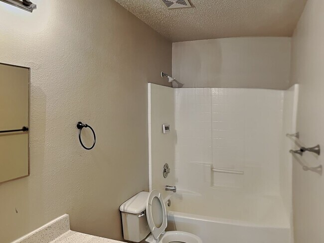 Building Photo - Corner Lot Charmer with Two-Story Deck and Bonus Game Room!