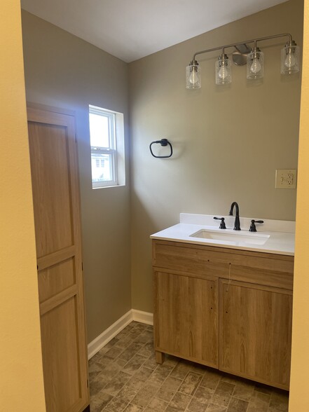 Hall bath large linen cabinet - 114 N 11th St