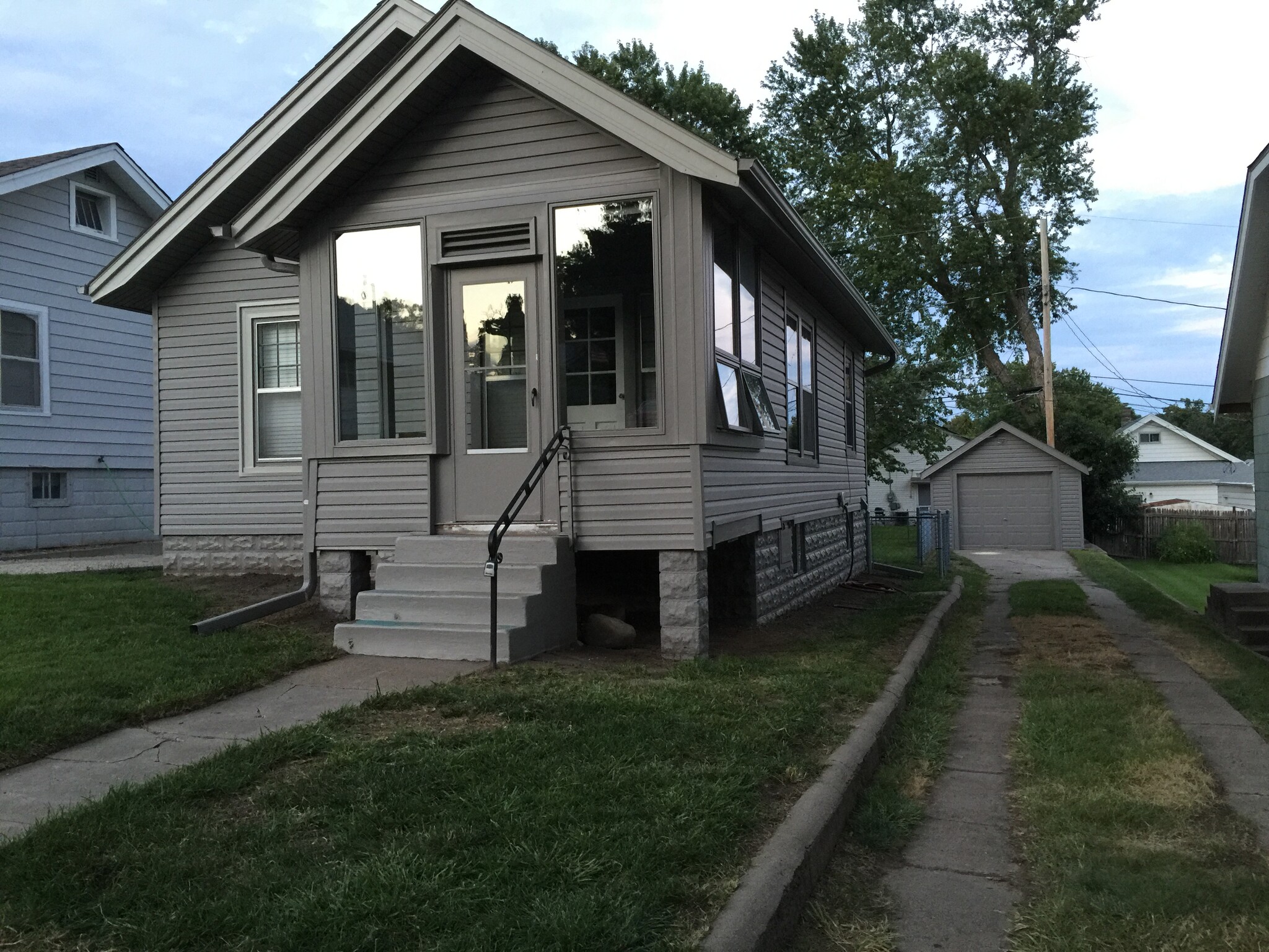 Enclosed front porch and detached garage - 2209 South 59th Street