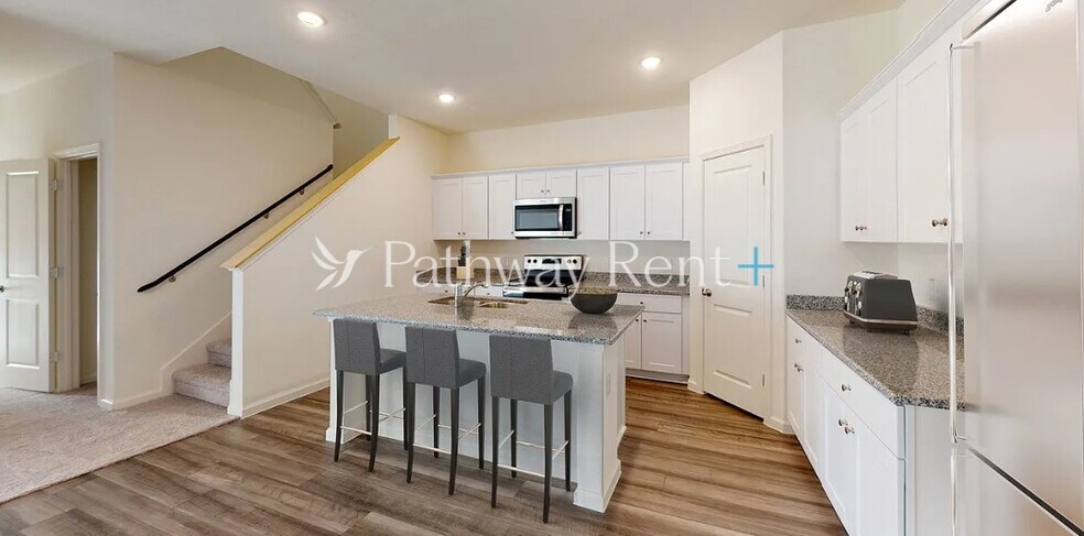 Building Photo - 202 Wild Daisy Wy