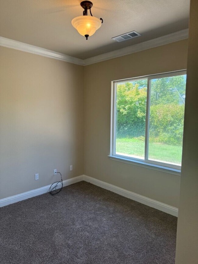 Building Photo - Enterprise Neighborhood 3 Bedroom Home with bonus room and 3 car garage- Landscaping Included!