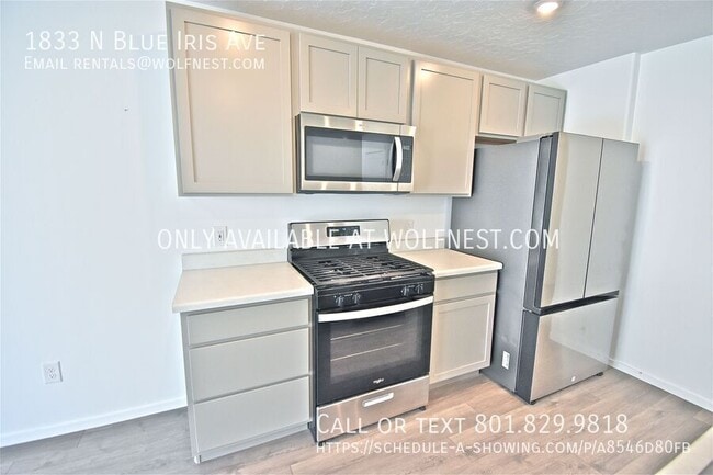 Building Photo - 1833 N Blue Iris Ave