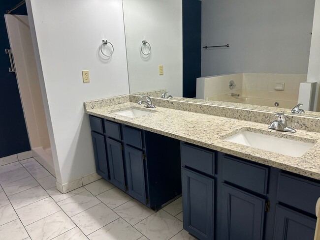 Building Photo - 4 Bedrooms with Finished Basement and Bonu...