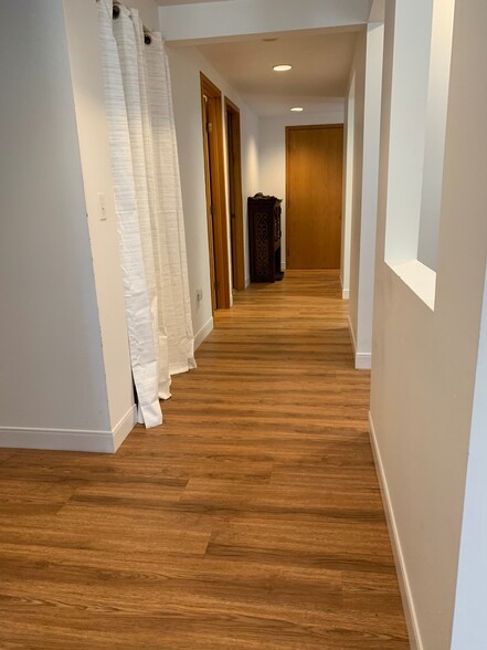 Hall to bedrooms. - 1047 Danby Rd
