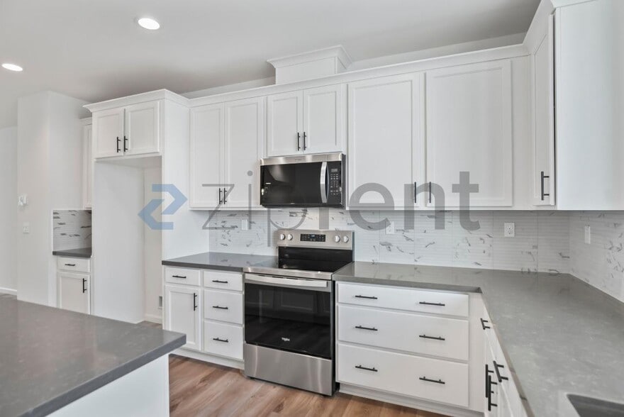 Building Photo - 6165 Raven Ave