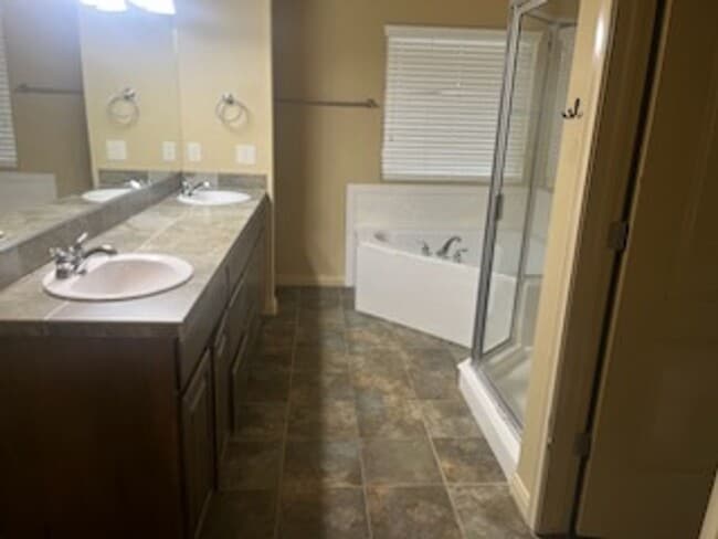 Building Photo - Spacious & Stylish 4-Bedroom Home with 3-Car Garage