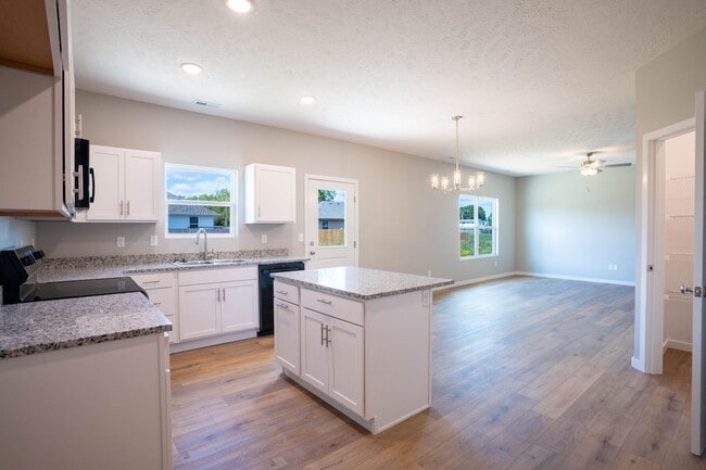 Building Photo - BRAND NEW 3 BEDROOM HOME WITH 3 CAR GARAGE