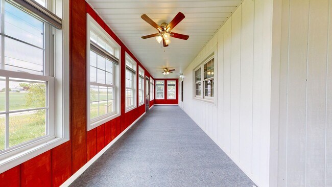 Building Photo - Country living! 1st floor laundry 3+ car garage with work shop