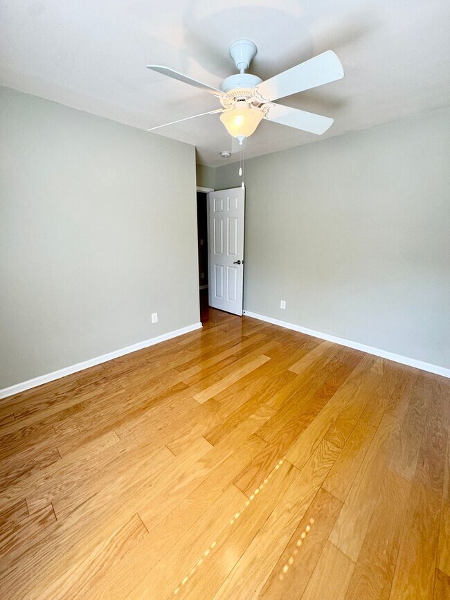 Building Photo - Like New 3 Bedroom & 2 Bath pond front home in Hillsborough! Enjoy the Community Pool, Playground...