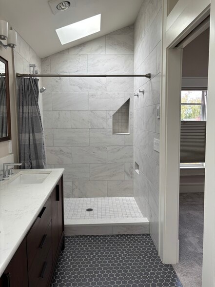 Shower with full tile surround - 211 W Boston St