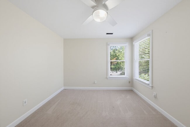 Building Photo - Southern Charm Meets Everyday Entertainment and Convenience!