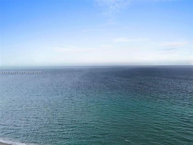 Building Photo - 18671 Collins Ave