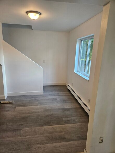 The living room area. looking up to the upstairs - 4304 Kateri Ln