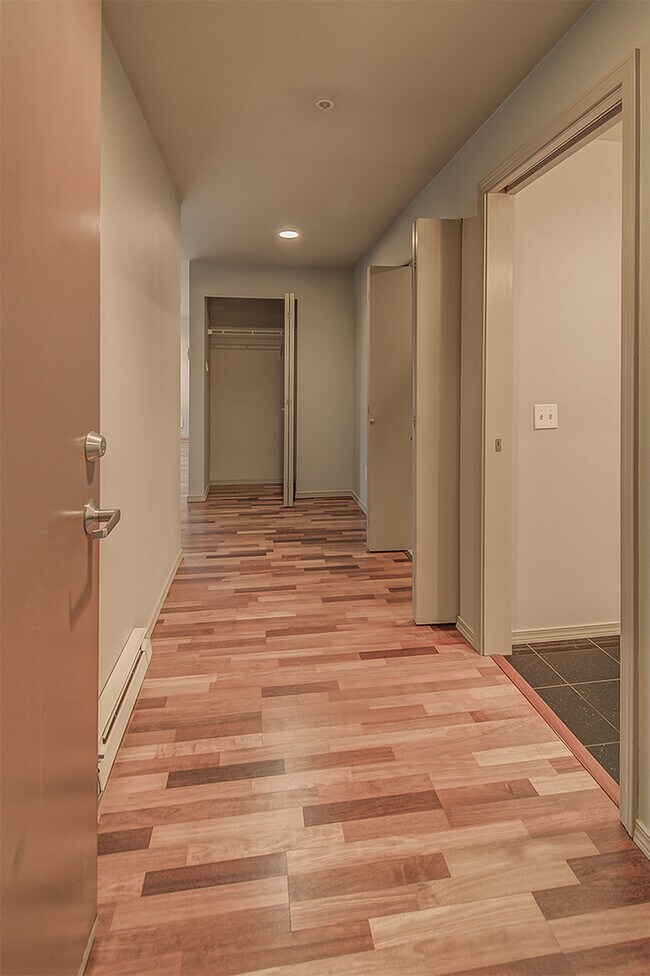 Building Photo - Top floor corner one-bedroom in the heart of it all, don't miss out, tour today!