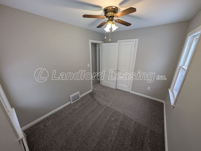 Building Photo - Well-Maintained Cape Cod with Garage on Corner Lot