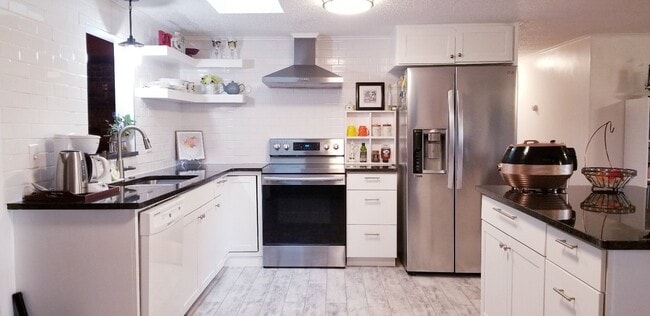 Building Photo - 4 bedroom 2 bath home, 2 car garage, SECLUDED AND PRIVATE, South FAY, 4 acres