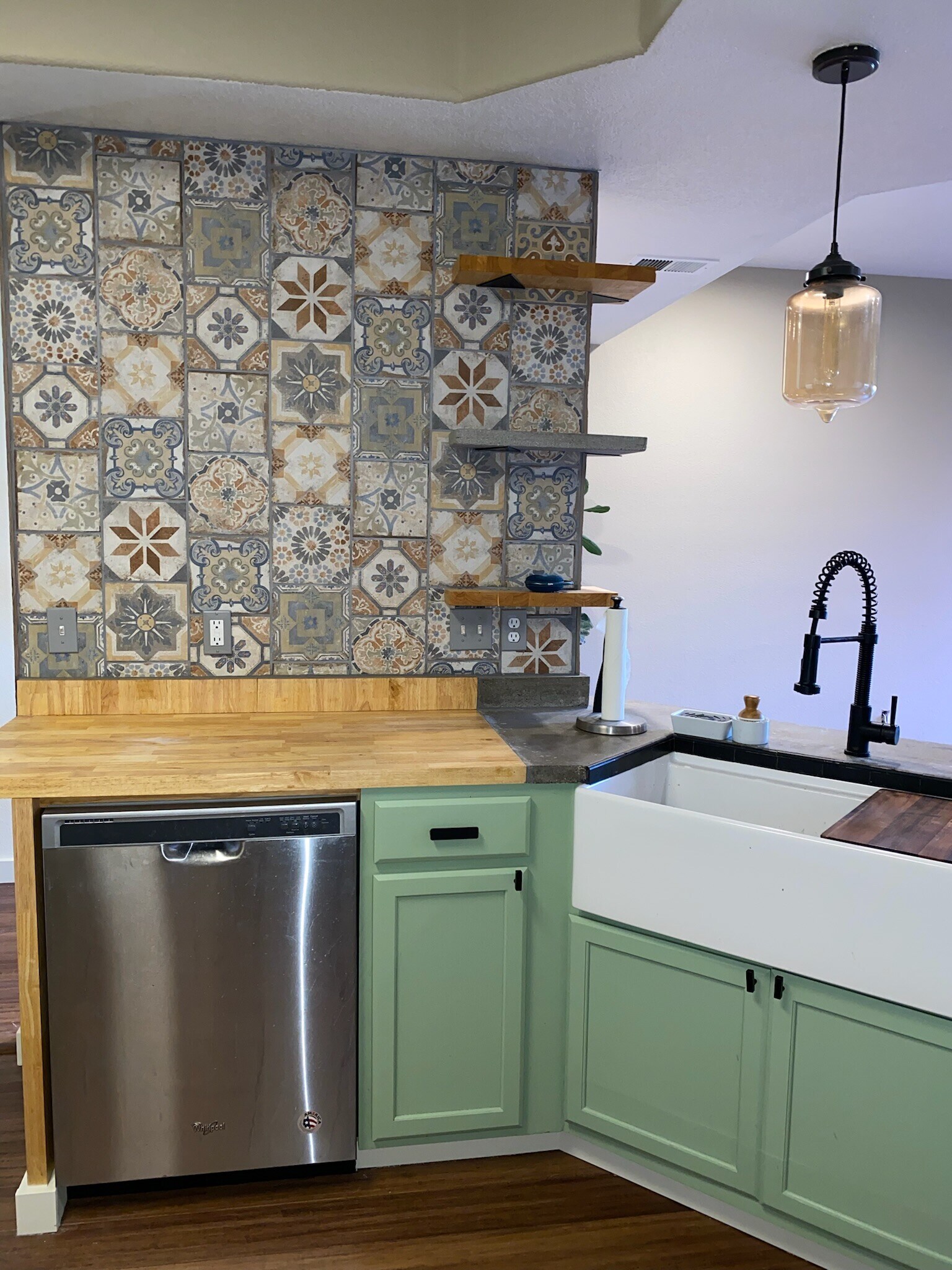 Dish washer with accent wall and shelves - 9056 Gale Blvd