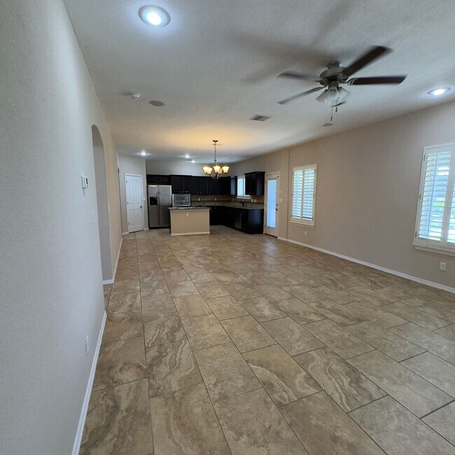Building Photo - 4 Bedrooms, 3 Baths, a Pool, and Solar Panels!