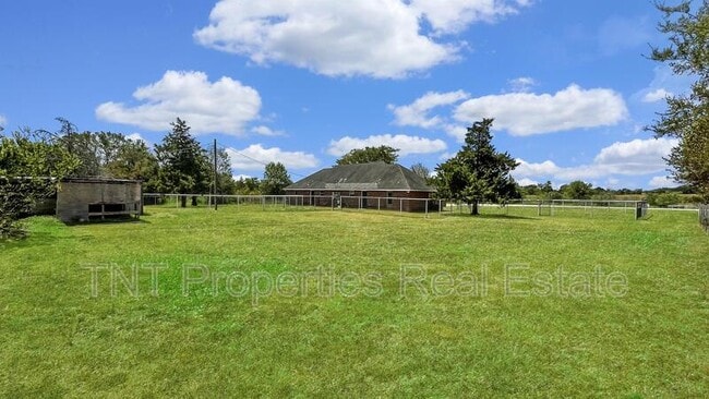 Building Photo - 9869 Risky's Ranch Dr