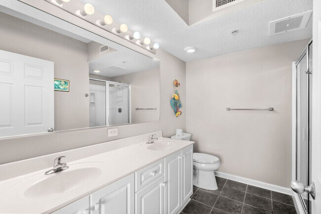 Building Photo - Spacious 3BR/3BA Coastal Retreat at Harbour Pointe – Utilities Included!