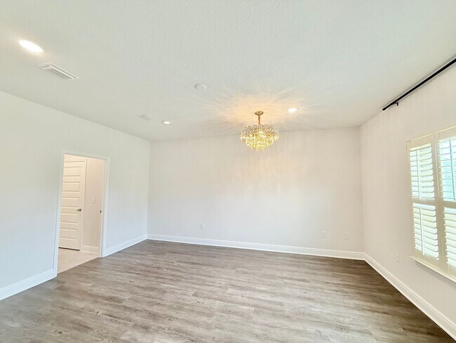 Building Photo - Spacious 4-Bedroom Home - Community Pool