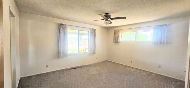 Building Photo - 5 bed 2.5 bath Single Story With 3 CAR Gar...