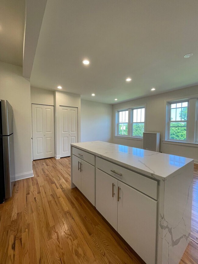 Building Photo - Brand New Renovation! 3 BR/ 2 BA On Quiet ...