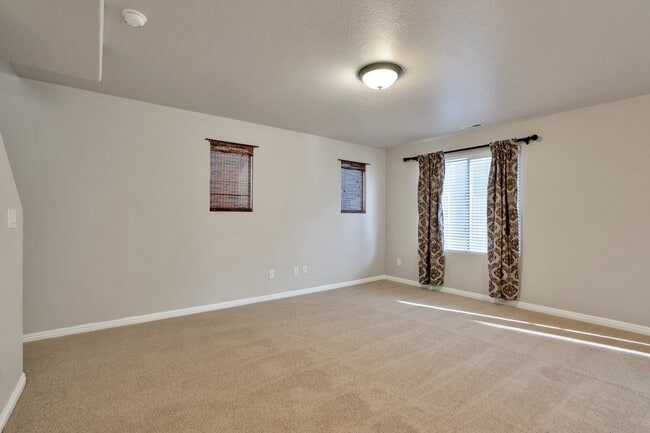 Building Photo - Pet Friendly Townhome w attached 2 car garage