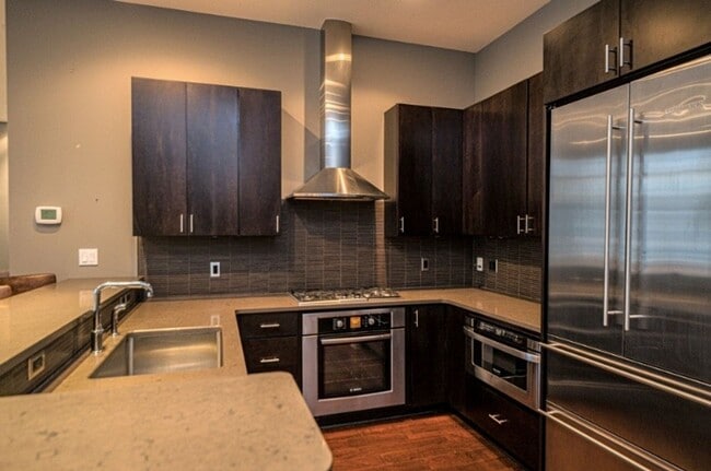 Building Photo - Luxury Penthouse Condo Downtown with Private Patio & Amazing Views Available Now!