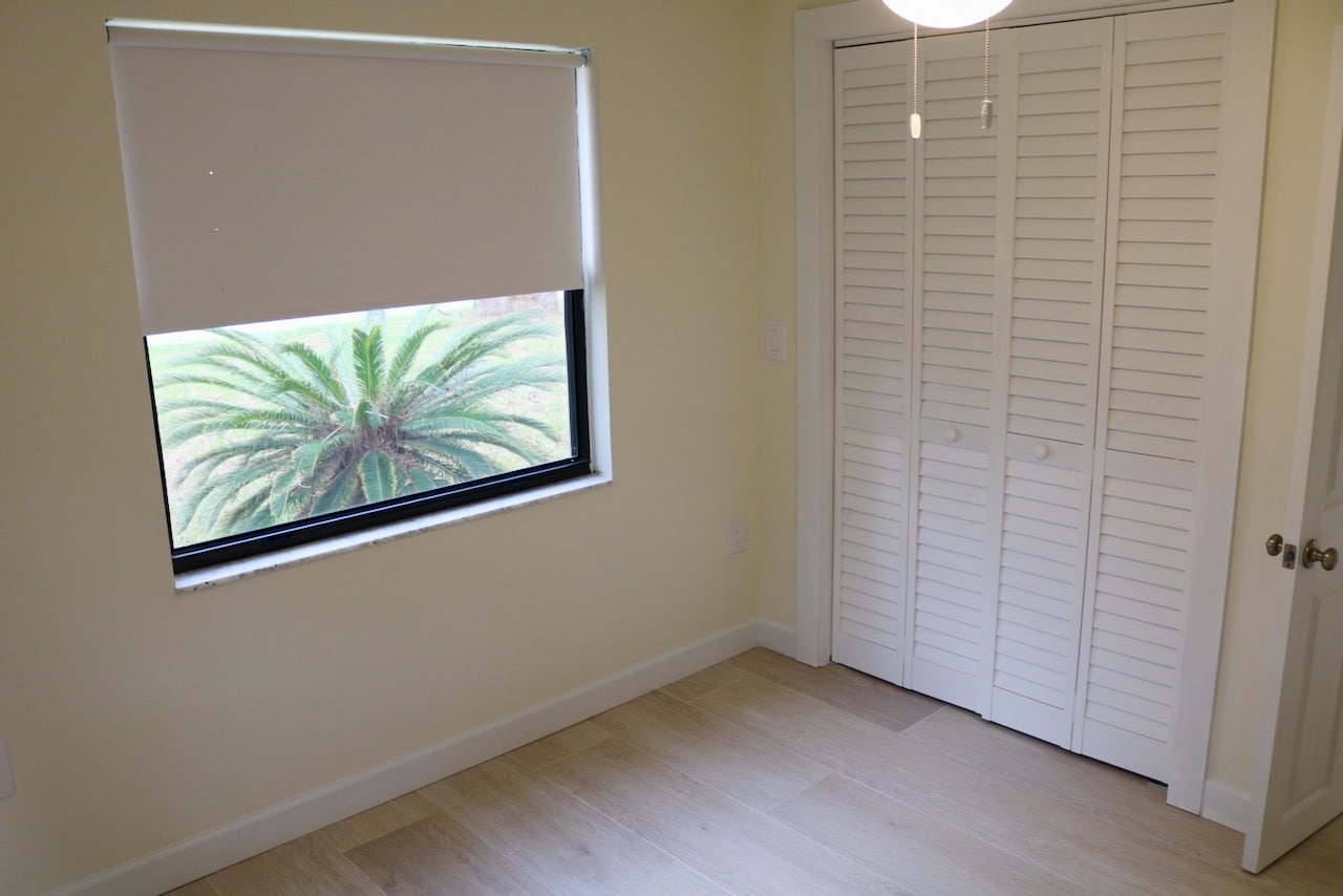 Second bedroom rivals the master in storage and windows. - 33 63rd St