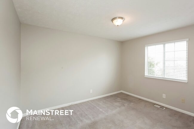 Building Photo - 607 Woods Crossing Dr