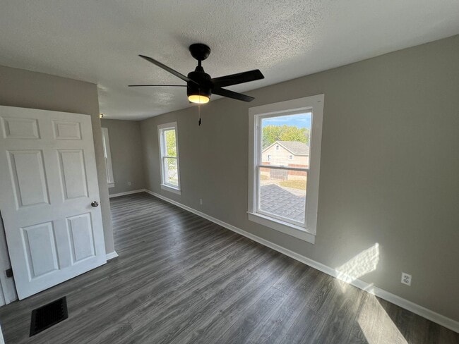 Building Photo - Updated 4-Bedroom Home with Plenty of Living and Storage Space.