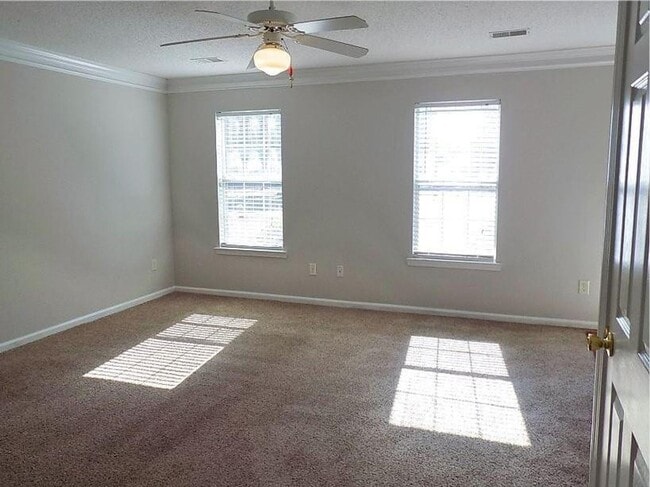 Building Photo - Spacious Condo with Expansive Pond Views