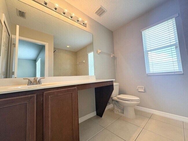 Building Photo - Gated 3B/2.5B Sanford Townhome ~ Fresh paint! ~ New flooring!