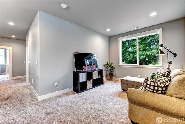 Building Photo - Luxury NW Living: 4 Bedroom Masterpiece with Dual Suites and Private Yard in Desirable Browns Point!