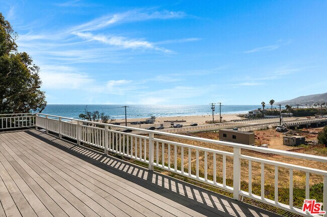 Building Photo - 6457 Surfside Way