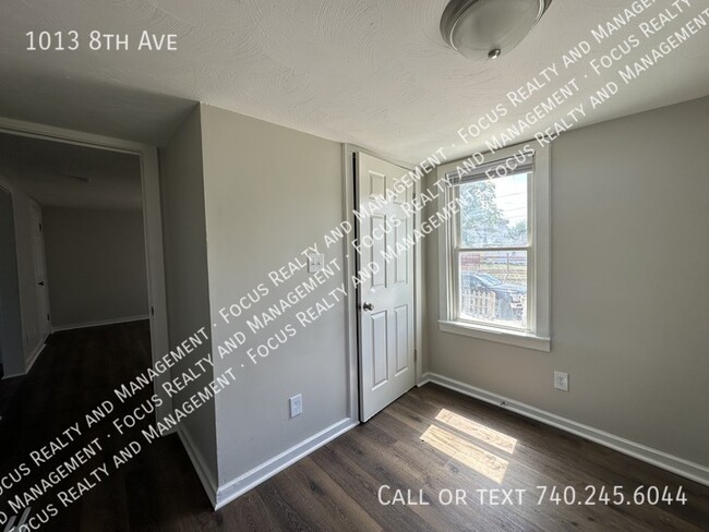 Building Photo - 1013 8th Ave